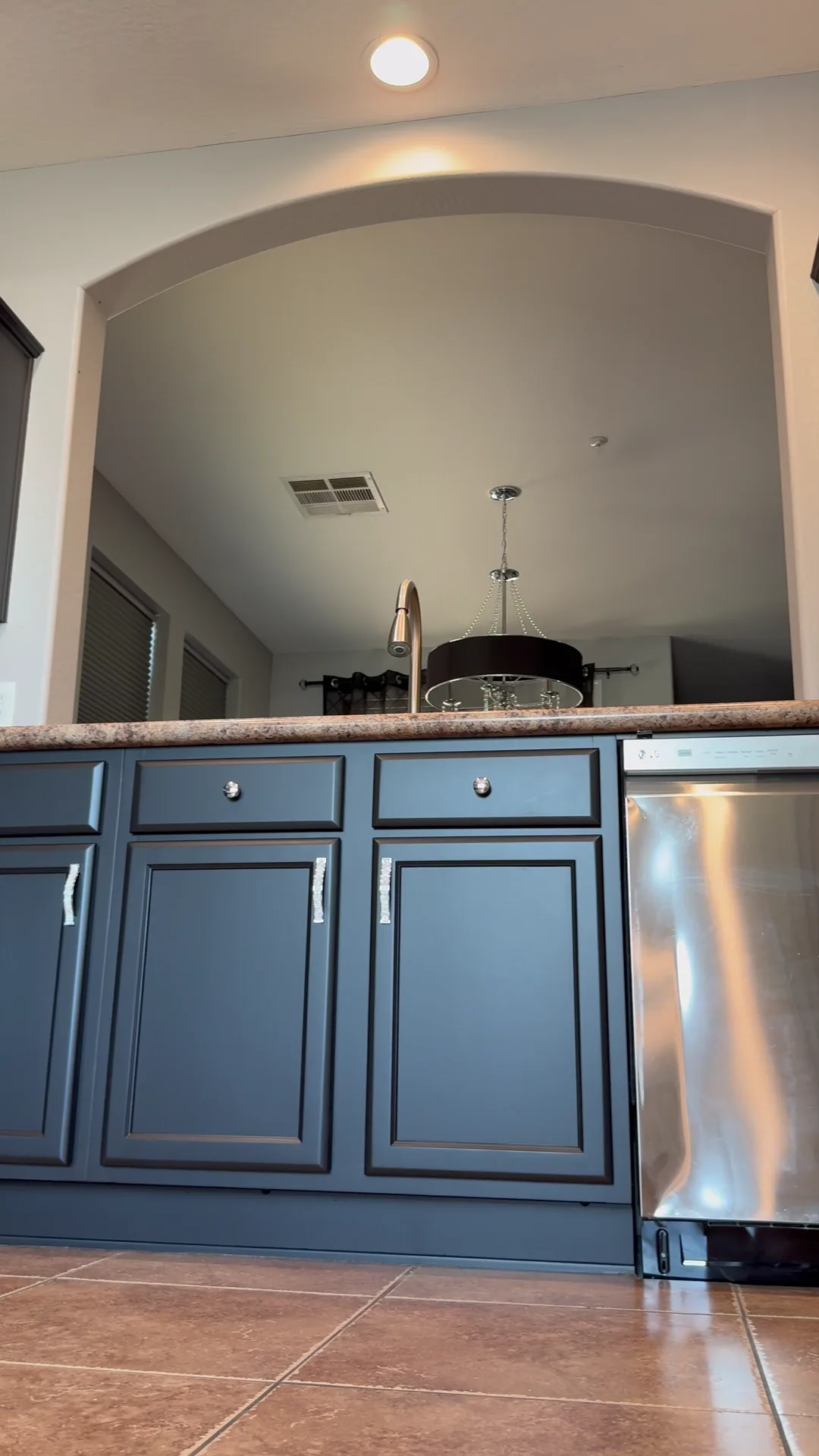 A slow pan across a finished East Valley kitchen with deep espresso cabinets refinished by Valley Painting Pros.